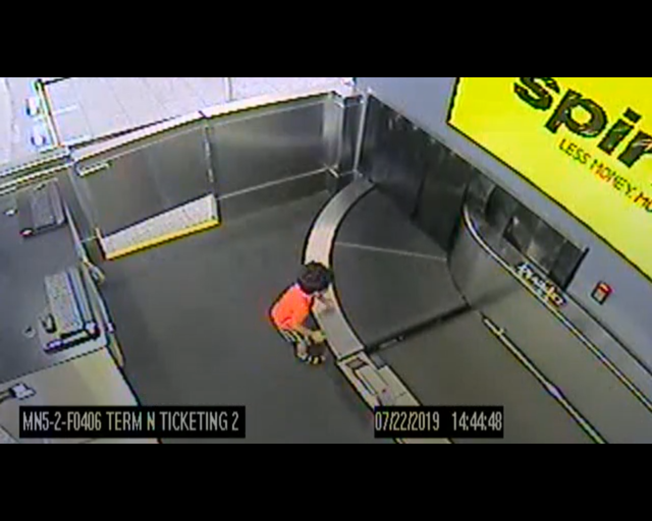 Dramatic video shows a toddler who climbed onto an airport luggage conveyor belt in the us, and rode around the baggage network.